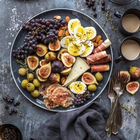 figs and eggs and olives plate